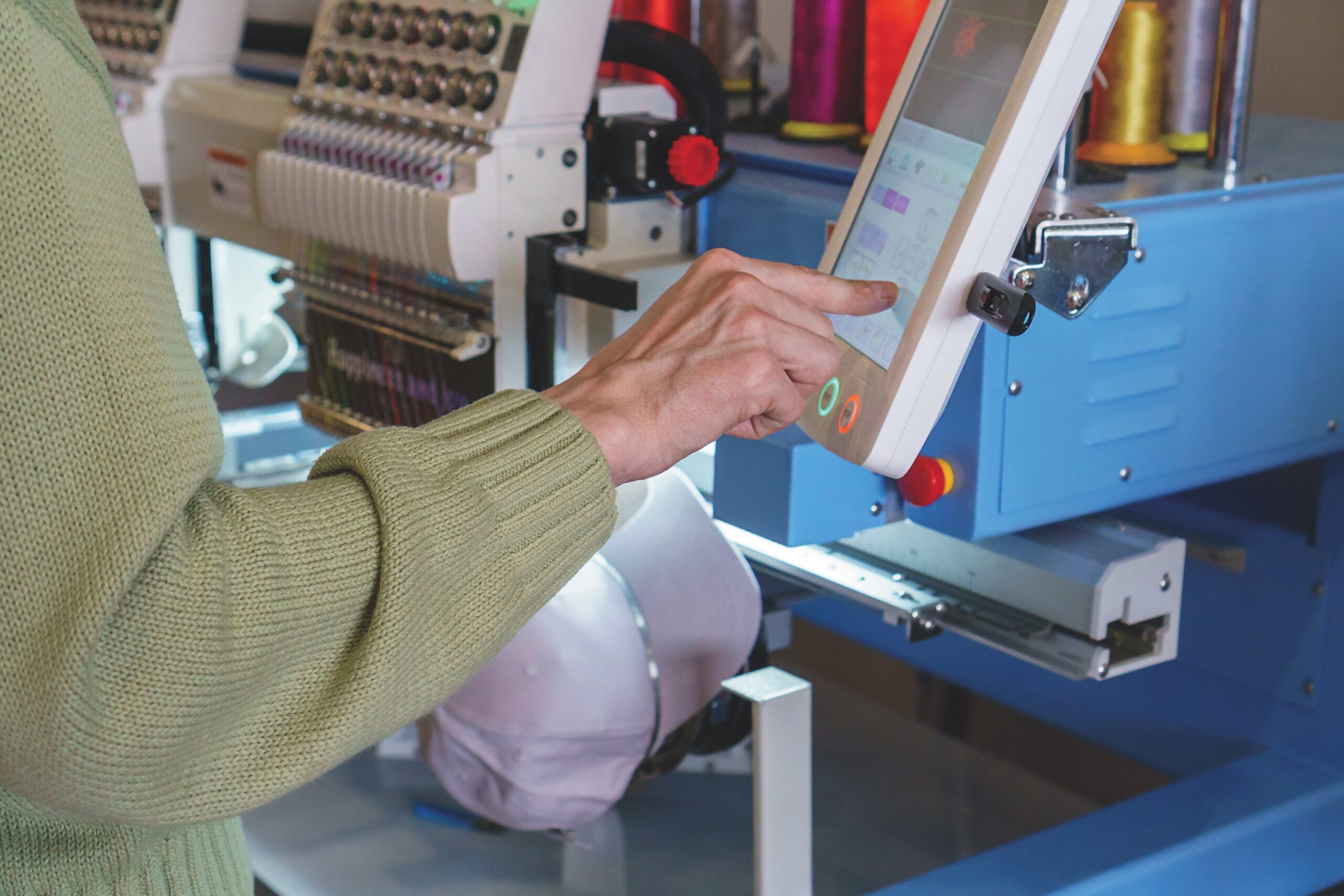 Commercial embroidery machine for custom decorated apparel