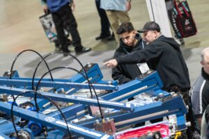 Automatic custom apparel screen printing press Impressions Expo