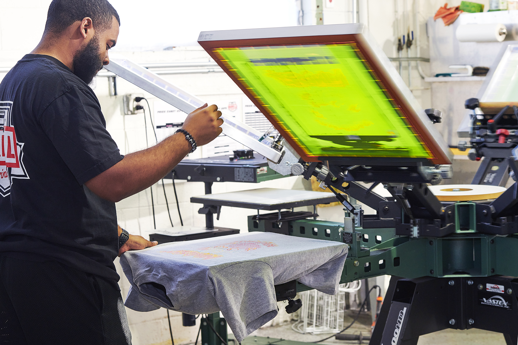 Screen printing a T-shirt, decorated apparel