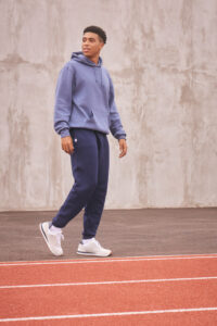 Male model wearing Russell Athletic DRI POWER FLEECE